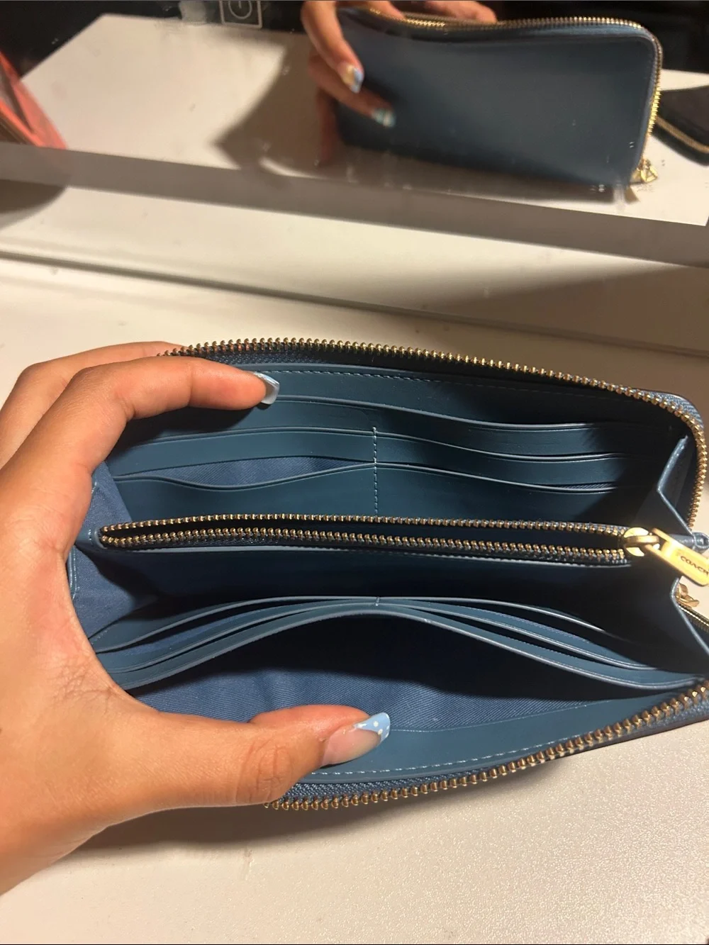 Coach compact zip